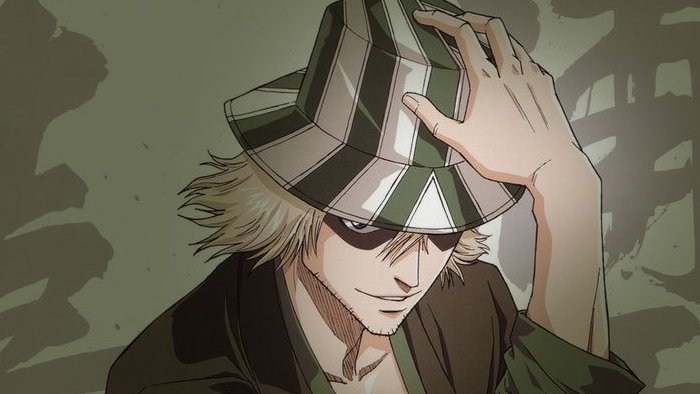 Kisuke Urahara smiling, holding his hat