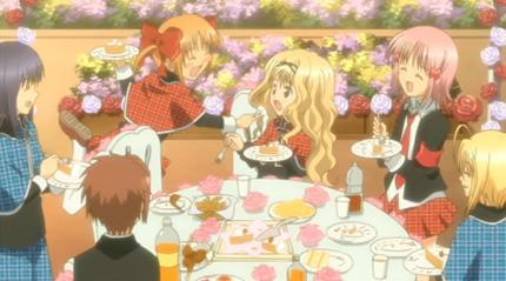 Rima Mashiro holding plate with cake, Yaya Yuiki attempting to feed Rima, Amu Hinamori laughing, Shugo Chara!