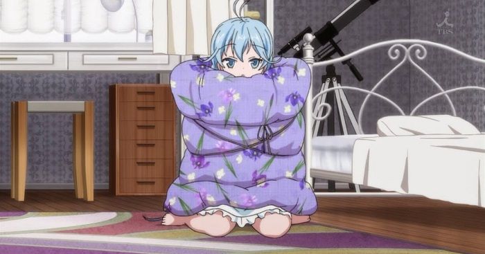 Erio Touwa wrapped up in a blanket